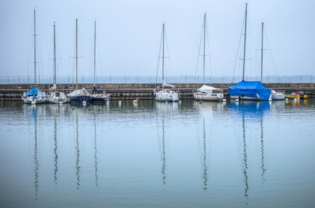 Sailboats at a marina at Lake Geneva, Switzerlandの写真素材
