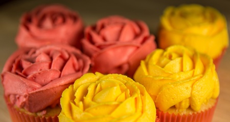 Cupcakes on a pastry boardの写真素材