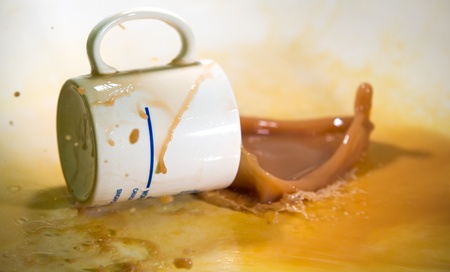 Chocolate drink spill on the floor の写真素材