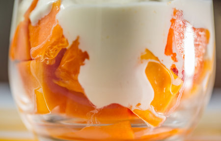 Papaya cube slices with yogurtの写真素材