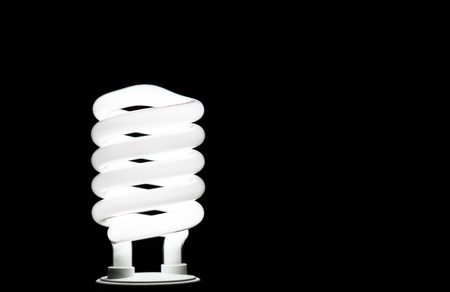 Light bulb over black backgroundの写真素材