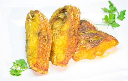 Portions of deep fried red snapper fish 
