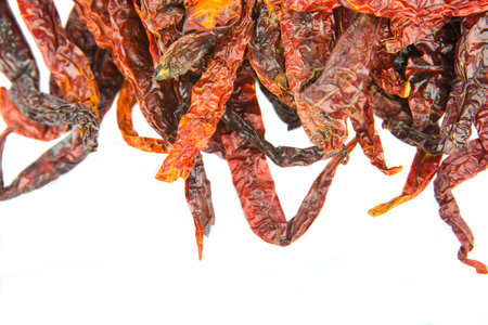 A group of dried chilly over white backgroundの写真素材