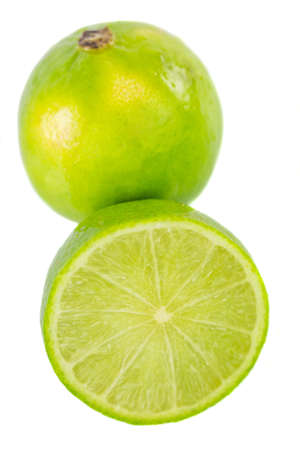 Slices of limes with white backgroundの写真素材