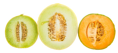Various type of melons cut in half over white background