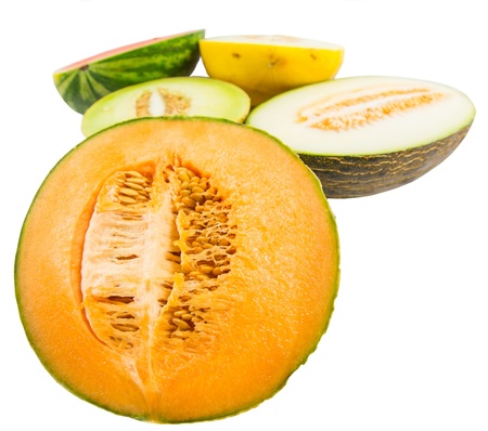 Various type of melons cut in half over white backgroundの写真素材