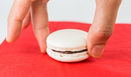 rench vanilla macarons with chocolate buttercream fillingsの写真素材