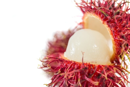 Ripe rambutan fruits over white backgroundの写真素材