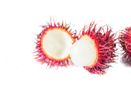 Ripe rambutan fruits over white backgroundの写真素材