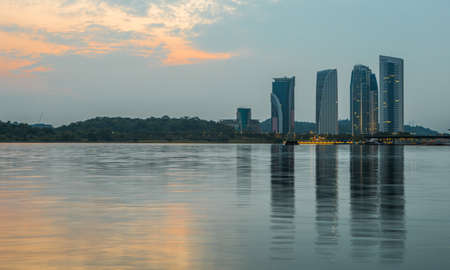 Modern building architecture and sunrise at Putrajaya Lake, Malaysiaのeditorial素材
