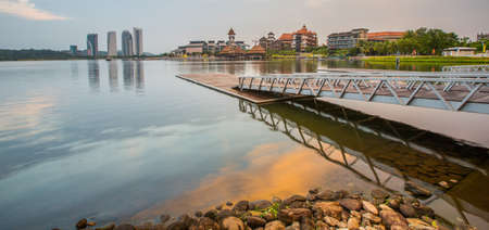 Modern building architecture and sunrise at Putrajaya Lake, Malaysiaのeditorial素材
