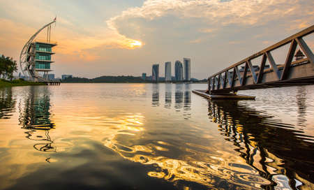 Modern building architecture and sunrise at Putrajaya Lake, Malaysiaのeditorial素材