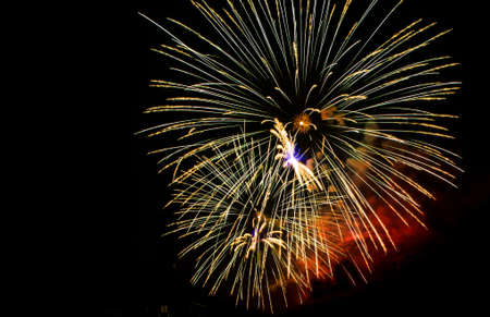 Fireworks display in the night sky の写真素材