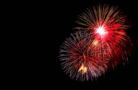 Fireworks display in the night sky の写真素材