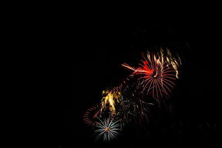 Fireworks display in the night sky の写真素材