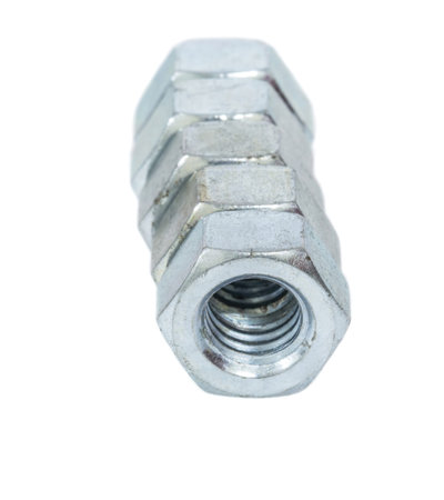 Old hexagon nuts over white background