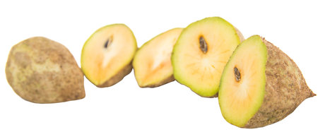 Sapodilla or chiku fruits over white background
