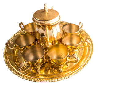 Old Middle Eastern tea set over white backgroundの写真素材
