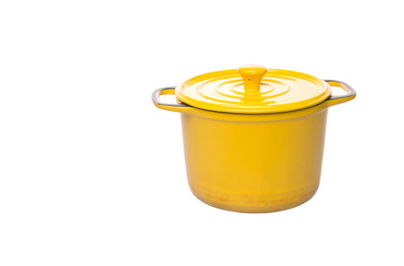 Yellow cooking pot over white の写真素材
