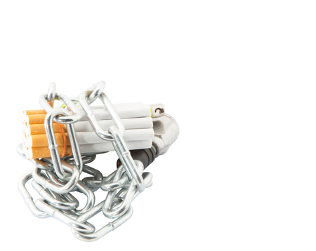 Concept image of cigarette addiction locked awayの写真素材