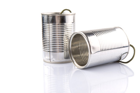 Tin can telephone over white backgroundの写真素材