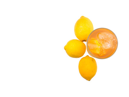 A glass of ice lemon tea over white backgroundの写真素材