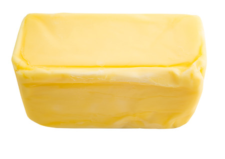 Fresh butter over white の写真素材