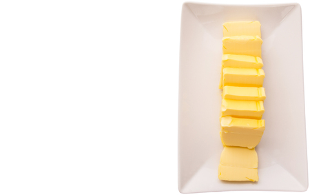 Fresh butter slices in a rowの写真素材