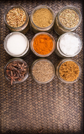 Sugar and Spices on a wicker backgroundの写真素材