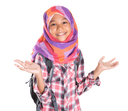 Muslim school girl with backpack over white backgroundの写真素材
