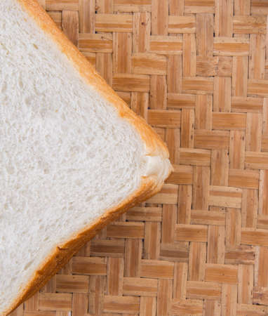Sandwich bread in a wicker tray の写真素材