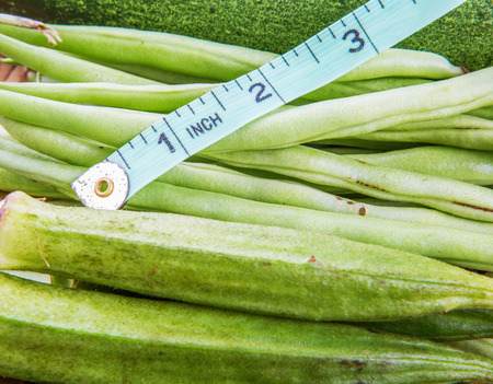 Asian tropical vegetable with measuring tape の写真素材