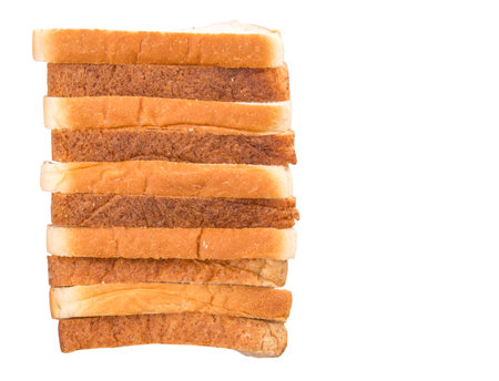 Whole wheat bread and sandwich bread over white background 