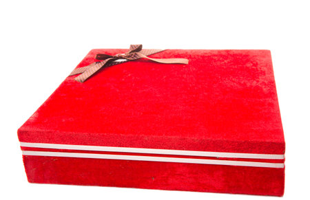 Red gift box over white backgroundの写真素材