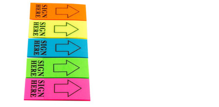 Colorful stick it SIGN HERE arrow tag over white background