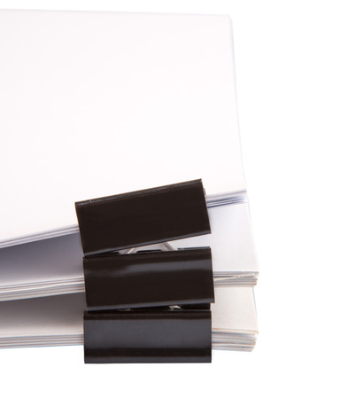 Binder clips with black white paper over white backgroundの写真素材