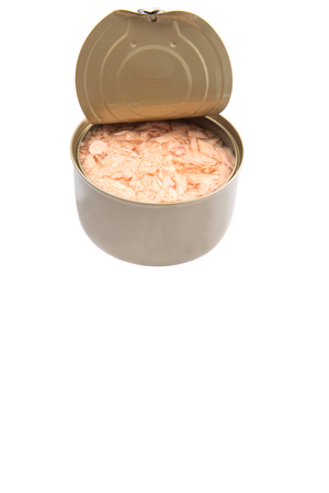 Pieces of tuna fish in a tin can over white backgroundの写真素材