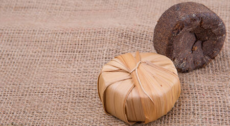 Palm sap sugar on a gunny sack clothの写真素材