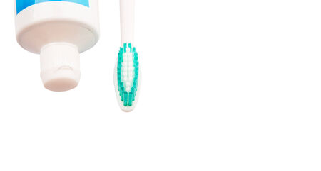 Toothbrush and toothpaste over white backgroundの写真素材