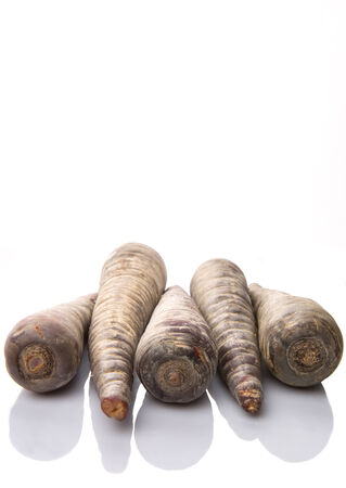 Purple carrot over white backgroundの写真素材