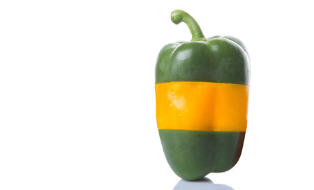 Mix colored bell pepper over white backgroundの写真素材