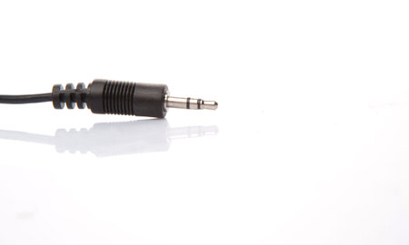 Audio jack over white background