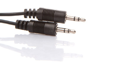 Audio jack over white background