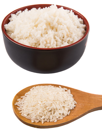Raw and cooked rice over white backgroundの写真素材