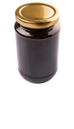 Bottled blueberry jam over white backgroundの写真素材