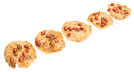 Rempeyek or peyek, a popular traditional deep-fried savoury Malaysian Javanese cracker over white backgroundの写真素材