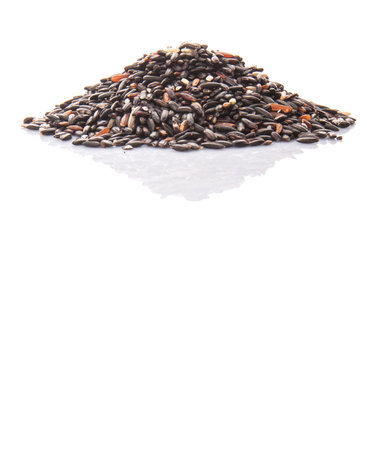 Black glutinous rice over white backgroundの写真素材