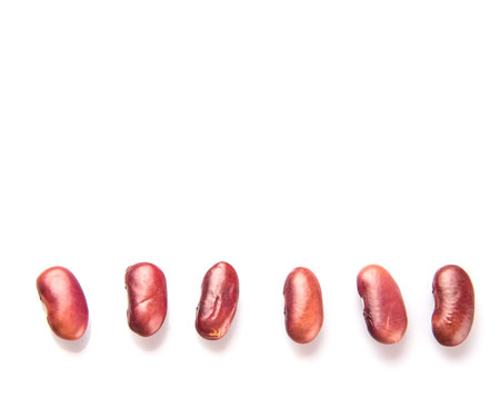 Red kidney beans over white backgroundの写真素材