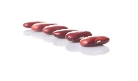 Red kidney beans over white background