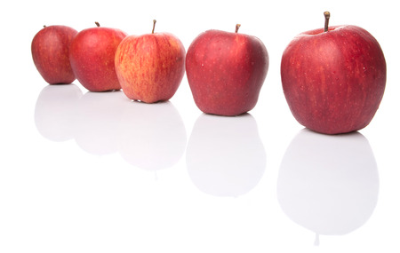 A group of red apples over white backgroundの写真素材